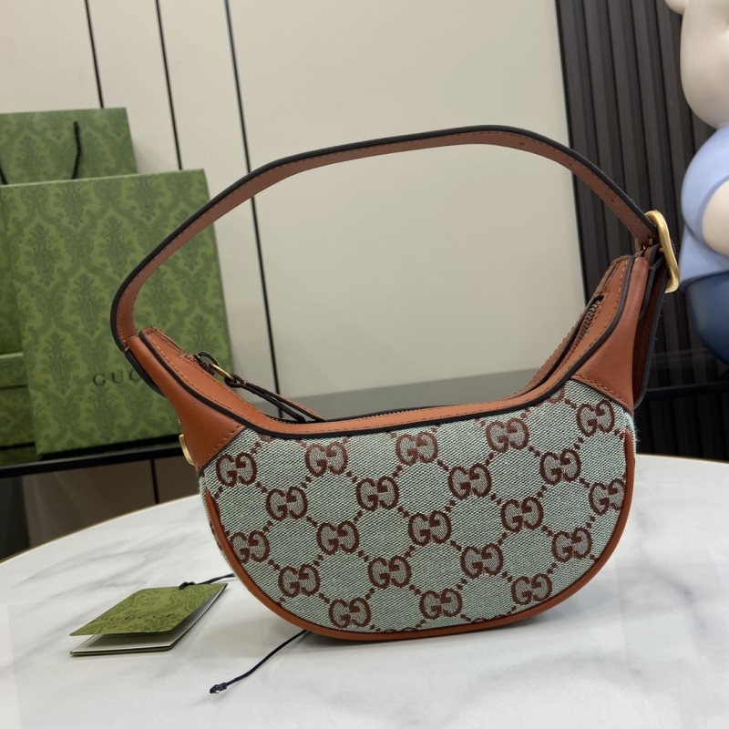 G*u*i top handle bags